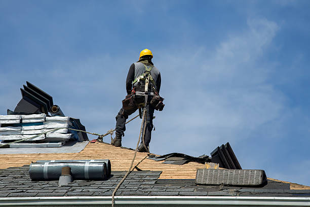 Professional Storm Damage Roof Repair technician working in Amherst, NH